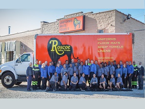 roscoe employees in front of truck for 100 years